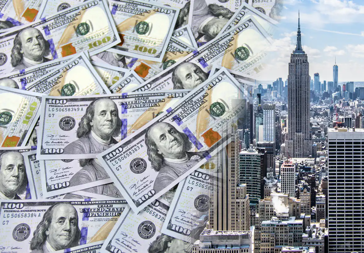 photo of money next to skyscraper
