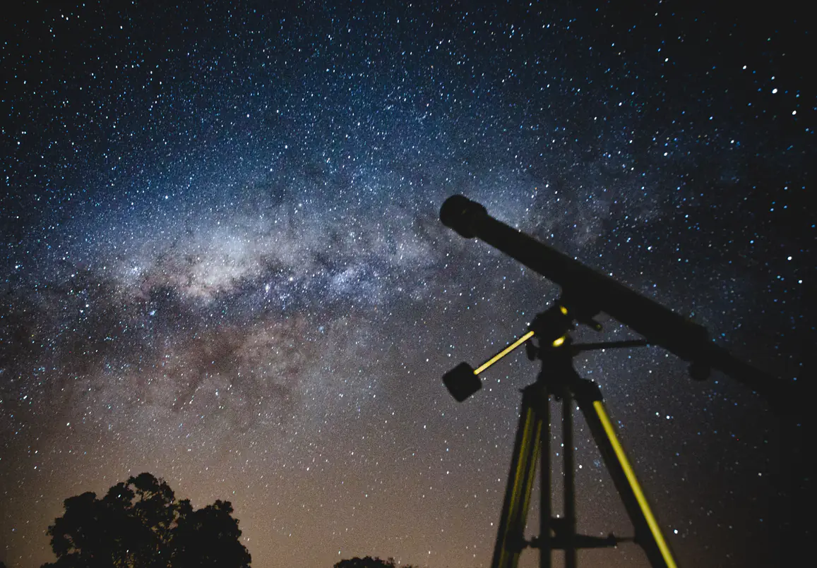 photo of a telescope looking at the galaxy