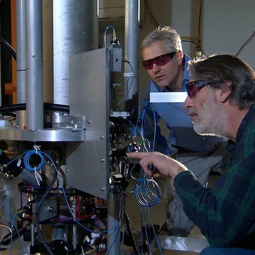 Physicists work on the NIST-F2 Atomic Clock